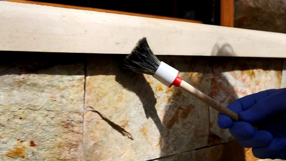 Don’t forget to protect the edges and the lower (overhanging) part of the stone. You can spread the product on these details with a regular paintbrush.