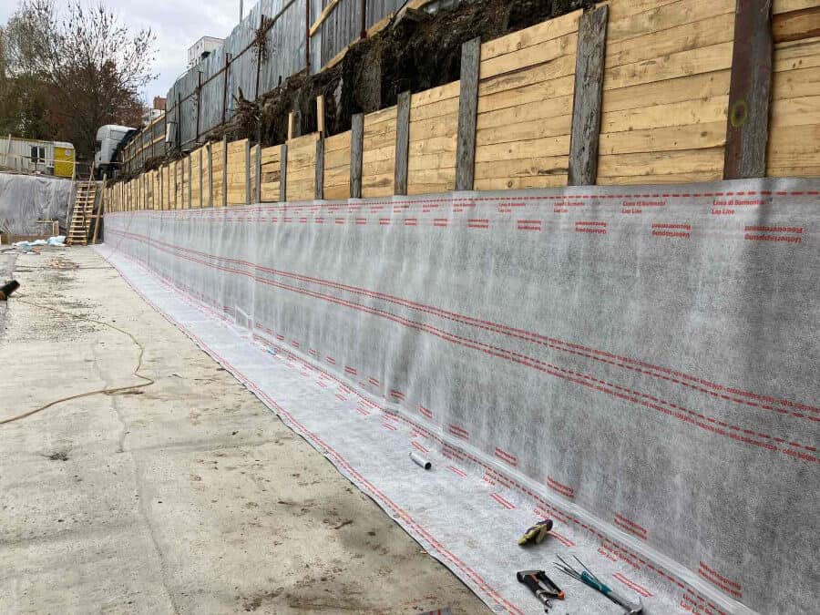 Excavation for the foundations of a residential building in Sofia, reinforced with Soldier Piles, ready for waterproofing with Amphibia 3000 GRIP.