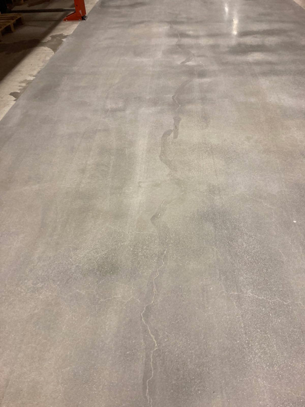 Before filling the cracks, the surface was refreshed through re-polishing using diamond discs. This process removed the compromised top layer and prepared the surface for subsequent repairs.