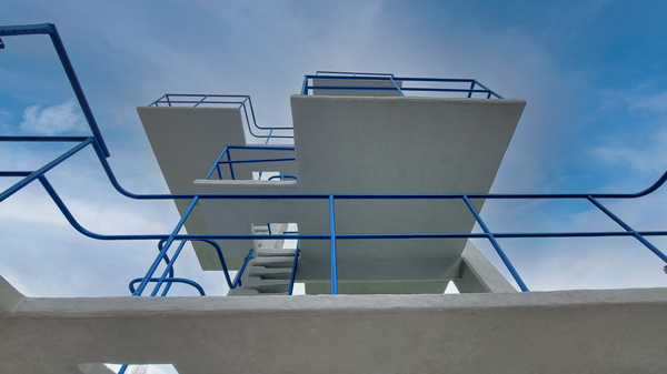 Renovated concrete diving tower with a smooth and aesthetic surface.