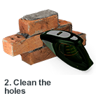 Once the holes have been drilled, clean them out by blowing or vacuuming out any residues.
